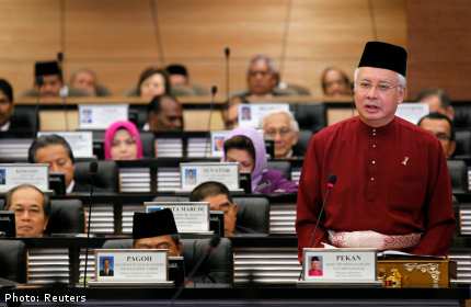 Najib offers handouts in pre-election Malaysian Budget 