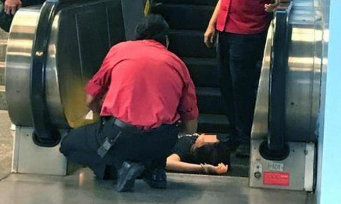 Woman Faints After Falling Down Escalator At Queenstown Mrt Station Was Not Using Phone