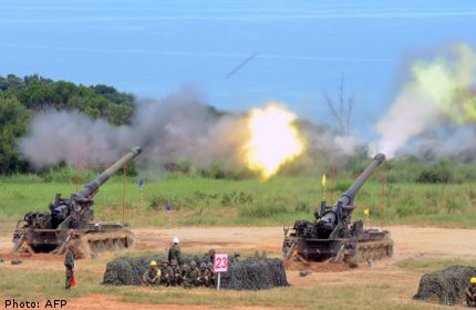 Taiwan tests new weapons in China war simulation