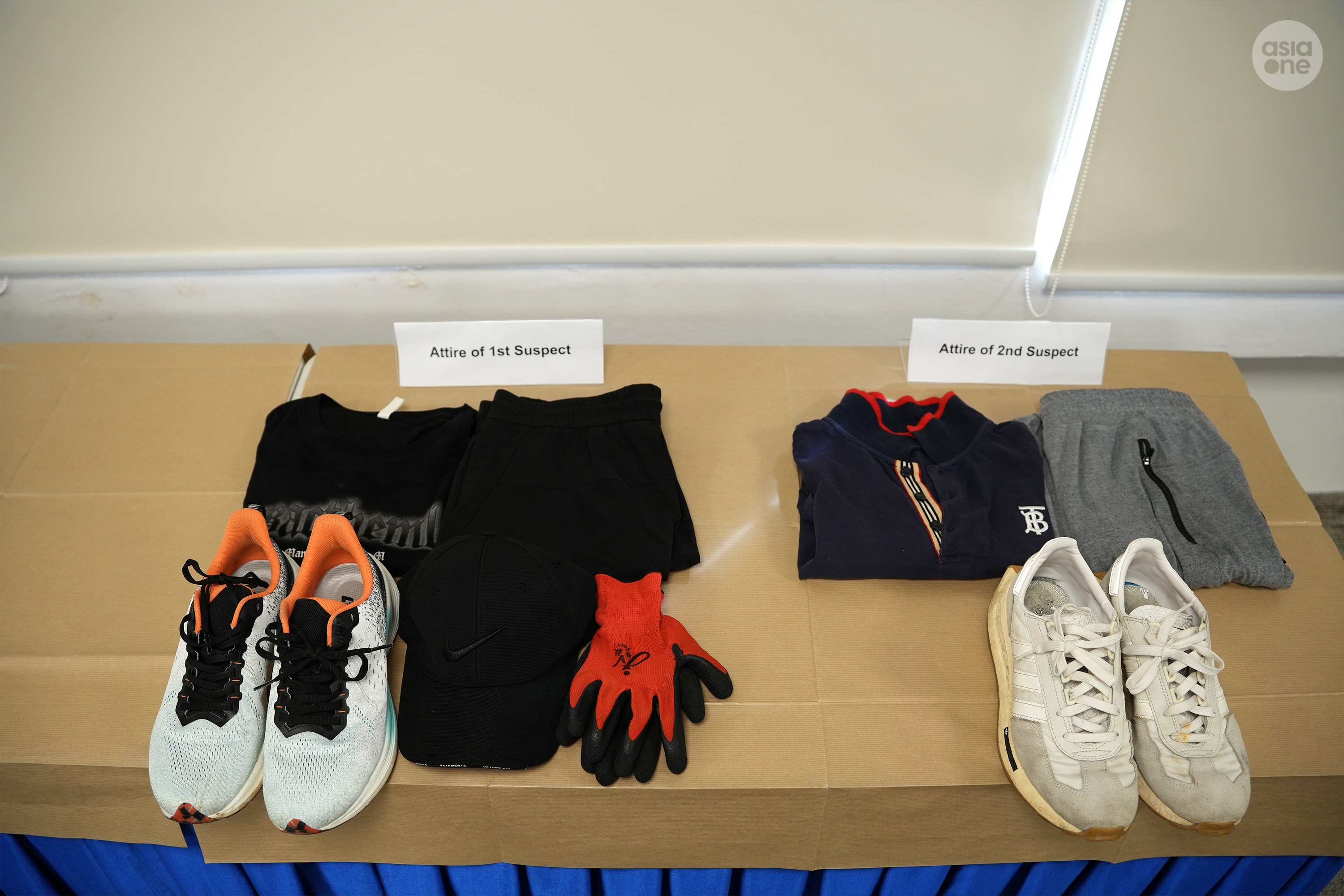 The two suspects wore track gear to commit the housebreaking and theft. 