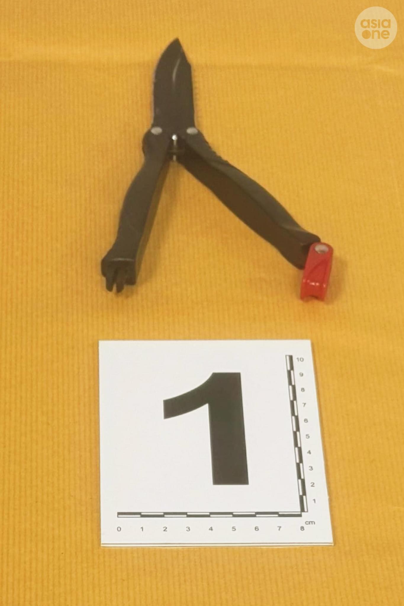 The foldable knife used by the 37-year-old Singaporean man to attack Rev Christopher Lee at St Joseph's Church on Nov 9 (Saturday).