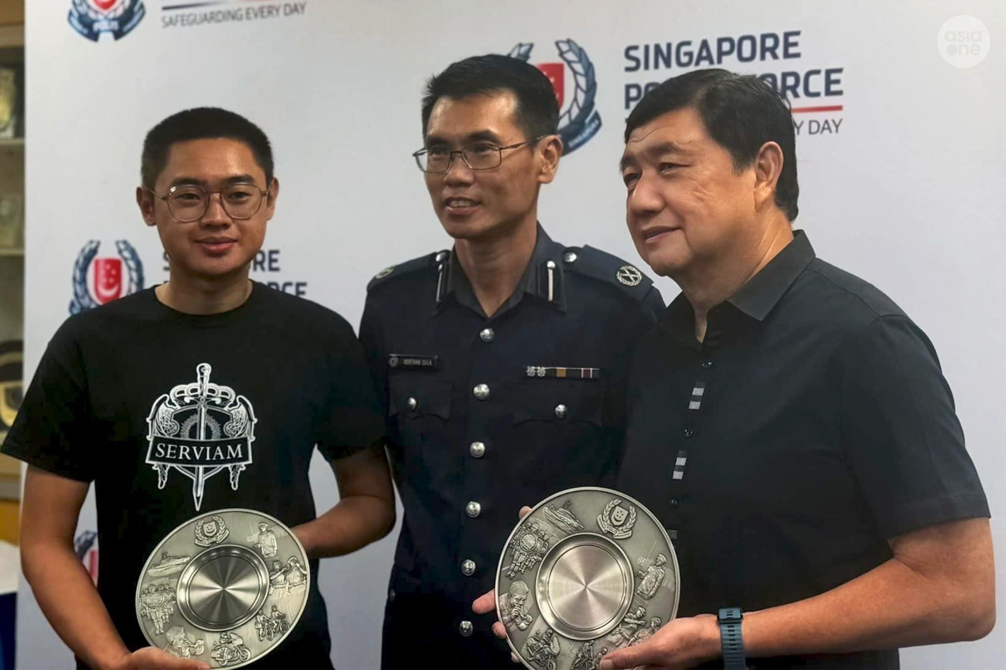 Mr Damien Liew Khee Rui and Mr Richard Tan Chai Boon were presented with the Public Spiritedness Award for their courage and public spiritedness in disarming and detaining the 37-year-old attacker until the police arrived. 