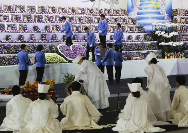 South Korean government holds first memorial for Sewol ferry disaster ...