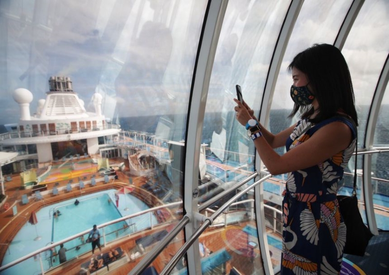 Royal Caribbean cruise to nowhere turns back due to suspected Covid-19