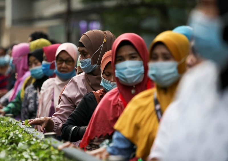 Malaysian women and children bear brunt of coronavirus ...