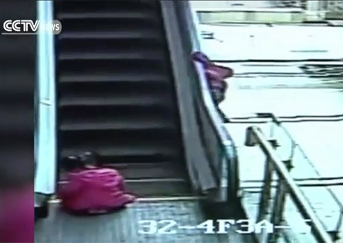 Clown Throwing Pie On Escalator