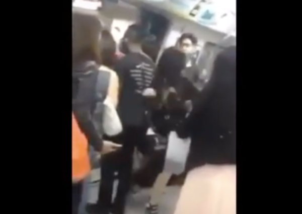 2 women fight and scream at each other until 1 gets pushed out of train ...
