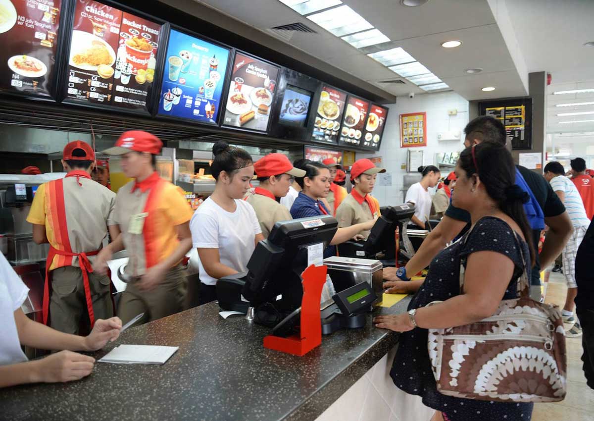 Philippines' Jolibee buys 40 per cent stake in US burger chain ...