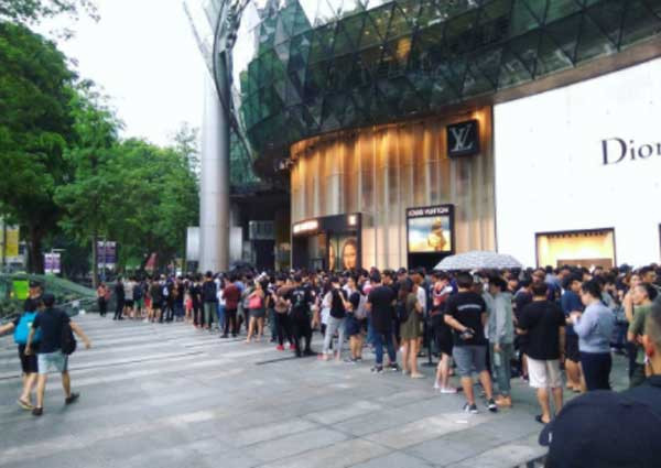 Excited fans queue overnight outside Ion Orchard for Louis Vuitton