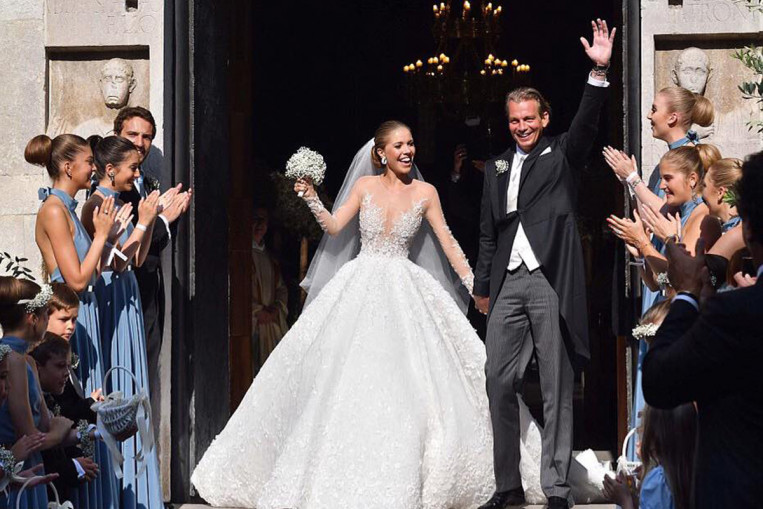 Swarovski heiress can't help but shine in wedding gown studded with ...