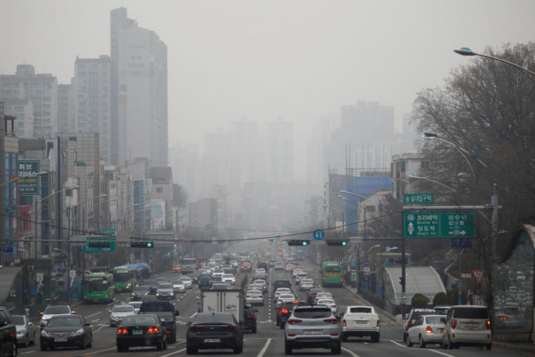 Pork for pollution? South Koreans fight smog with grease