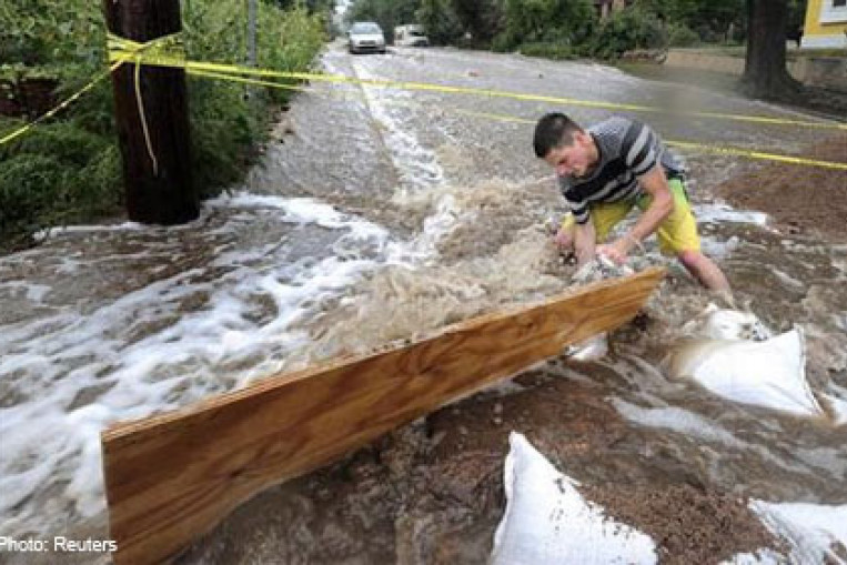 Three dead as Colorado floods worsen, smashing rainfall records, World