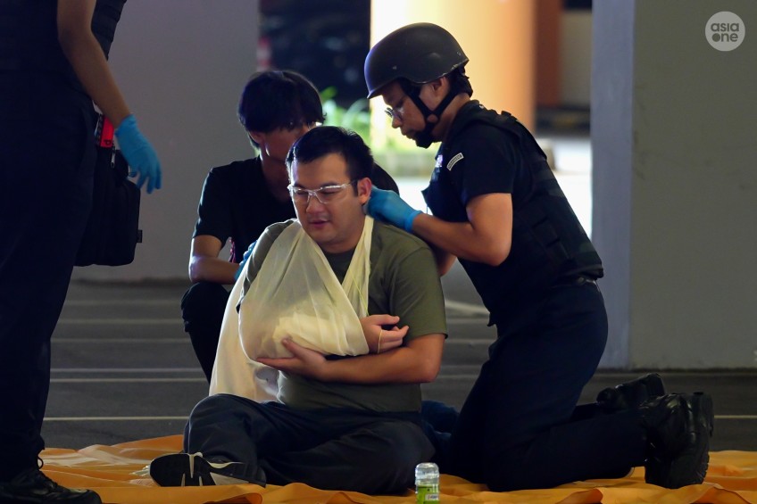 An ITE College West student, who is also a Civil Defence Lionhearter, administering first aid during Exercise Heartbeat 2024 on Nov 18